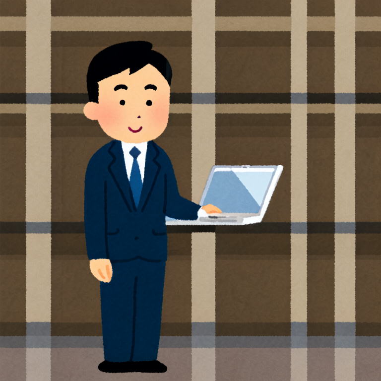 パソコンを使うスーツの男性